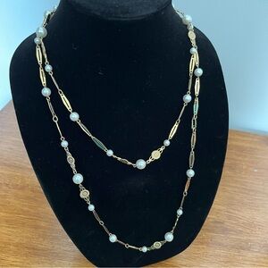 Vintage long gold and pearl necklace